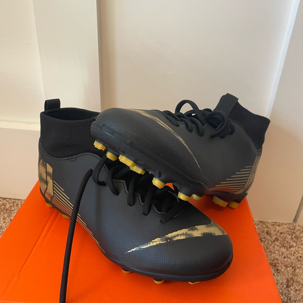 Nike Youth Black and Gold Soccer Cleats